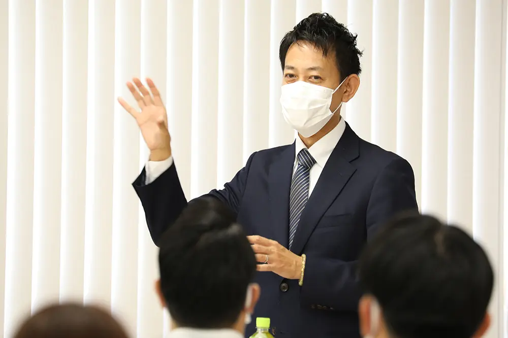 稲井統括本部長